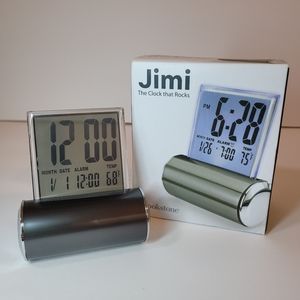 Brookstone JIMI THE CLOCK THAT ROCKS Lighted Motion Alarm Temperature Gray NEW